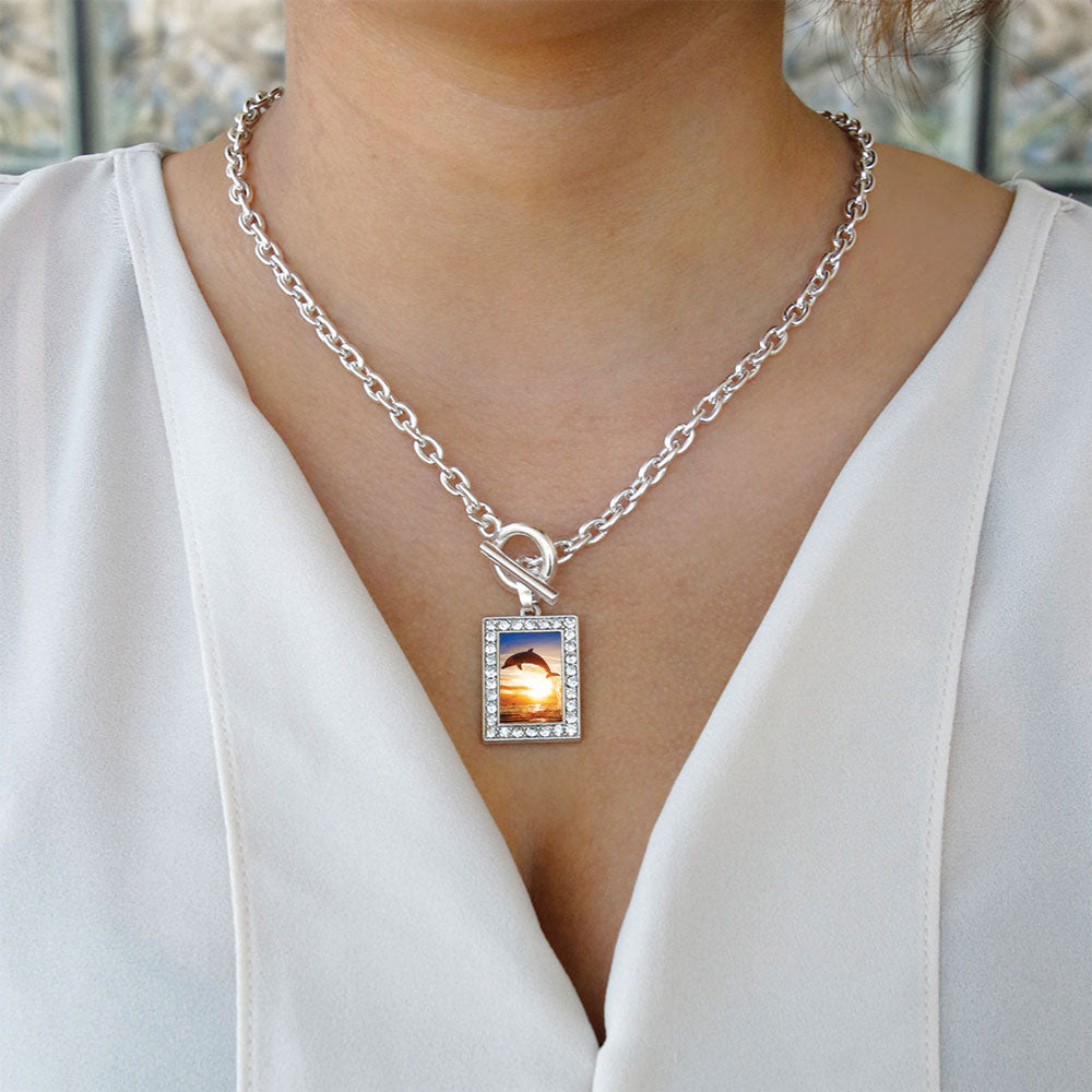 Silver Dolphin in the Sunset Rectangle Charm Toggle Necklace