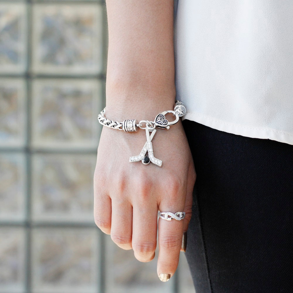 Silver Hockey Sticks & Puck Charm Braided Bracelet
